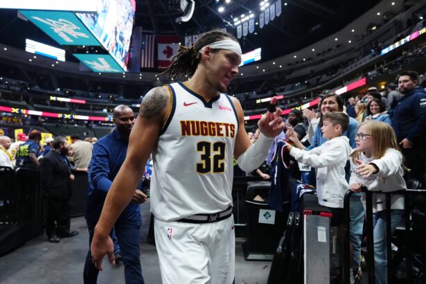 Nov 5, 2025; Denver, Colorado, USA; Denver Nuggets forward Aaron Gordon (32) following the game against the Miami Heat in the second half at Ball Arena. Mandatory Credit: Ron Chenoy-Imagn Images
