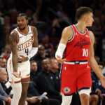 Nov 6, 2025; Phoenix, Arizona, USA; Phoenix Suns guard Jalen Green (4) celebrates a three point shot against the Los Angeles Clippers in the first half at the Mortgage Matchup Center. Mandatory Credit: Mark J. Rebilas-Imagn Images