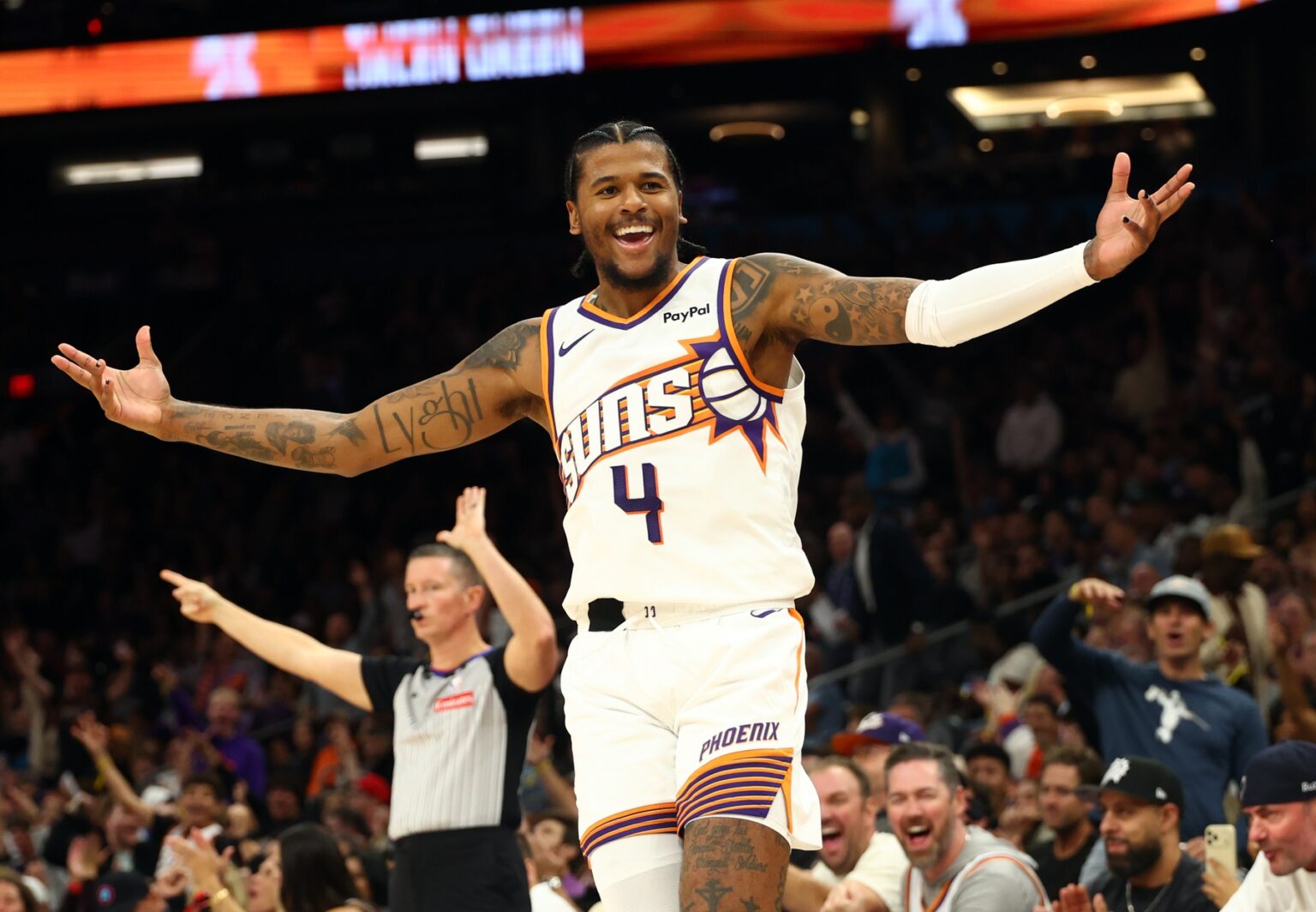 Nov 6, 2025; Phoenix, Arizona, USA; Phoenix Suns guard Jalen Green (4) celebrates a three point shot against the Los Angeles Clippers in the second half at the Mortgage Matchup Center. Mandatory Credit: Mark J. Rebilas-Imagn Images