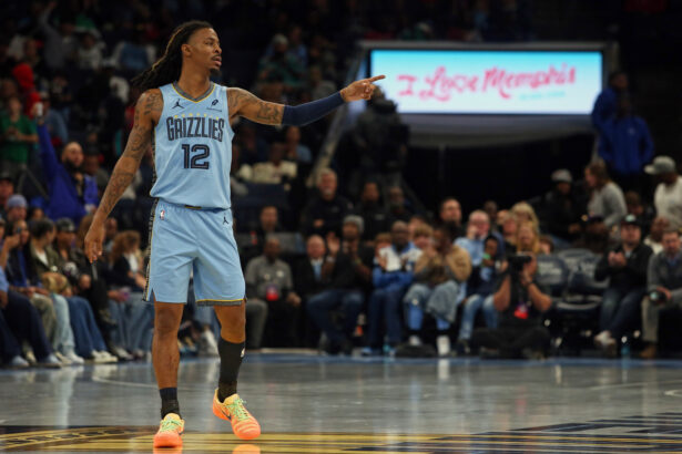 Nov 7, 2025; Memphis, Tennessee, USA; Memphis Grizzlies guard Ja Morant (12) gestures during the second quarter against the Dallas Mavericks at FedExForum. Mandatory Credit: Petre Thomas-Imagn Images