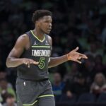 Nov 7, 2025; Minneapolis, Minnesota, USA; Minnesota Timberwolves guard Anthony Edwards (5) celebrates making a three-point shot against the Utah Jazz in the second half at Target Center. Mandatory Credit: Jesse Johnson-Imagn Images