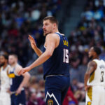 Nov 8, 2025; Denver, Colorado, USA; Denver Nuggets center Nikola Jokic (15) calls out in the second quarter against the Indiana Pacers at Ball Arena. Mandatory Credit: Ron Chenoy-Imagn Images