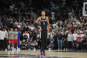 Nov 8, 2025; San Antonio, Texas, USA; San Antonio Spurs forward Victor Wembanyama (1) looks up in the second half against the New Orleans Pelicans at Frost Bank Center. Mandatory Credit: Daniel Dunn-Imagn Images