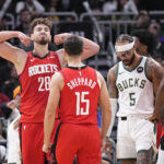 Nov 9, 2025; Milwaukee, Wisconsin, USA; Houston Rockets center Alperen Sengun (28) flexes after making a basket in the final minute of the game at Fiserv Forum. Mandatory Credit: Michael McLoone-Imagn Images