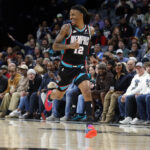 Nov 9, 2025; Memphis, Tennessee, USA; Memphis Grizzlies guard Ja Morant (12) reacts after a basket during the second quarter against the Oklahoma City Thunder at FedExForum. Mandatory Credit: Petre Thomas-Imagn Images