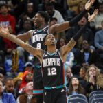 Nov 9, 2025; Memphis, Tennessee, USA; Memphis Grizzlies forward/center Jaren Jackson Jr. (8) and guard Ja Morant (12) react during the third quarter against the Oklahoma City Thunder at FedExForum. Mandatory Credit: Petre Thomas-Imagn Images