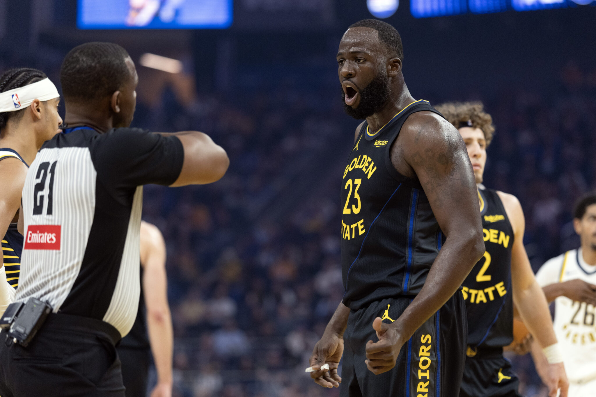 Nov 9, 2025; San Francisco, California, USA; Golden State Warriors forward Draymond Green (23) argues a foul call with referee Dedric Taylor (21) during the first quarter against the Indiana Pacers at Chase Center. Mandatory Credit: D. Ross Cameron-Imagn Images
