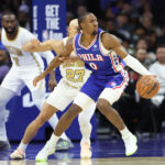 Nov 11, 2025; Philadelphia, Pennsylvania, USA; Philadelphia 76ers guard Tyrese Maxey (0) controls the ball against Boston Celtics guard Jordan Walsh (27) during the second quarter at Xfinity Mobile Arena. Mandatory Credit: Bill Streicher-Imagn Images