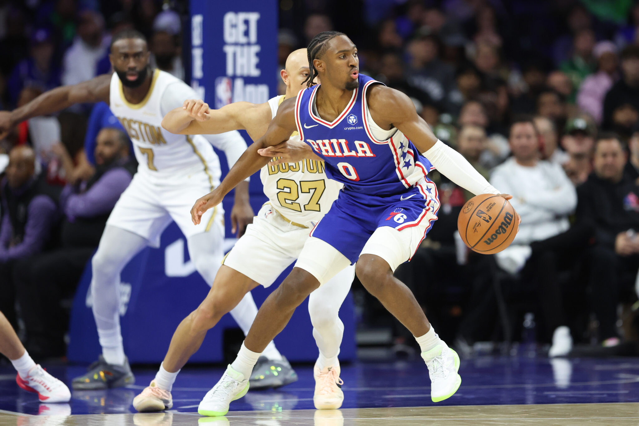 Nov 11, 2025; Philadelphia, Pennsylvania, USA; Philadelphia 76ers guard Tyrese Maxey (0) controls the ball against Boston Celtics guard Jordan Walsh (27) during the second quarter at Xfinity Mobile Arena. Mandatory Credit: Bill Streicher-Imagn Images