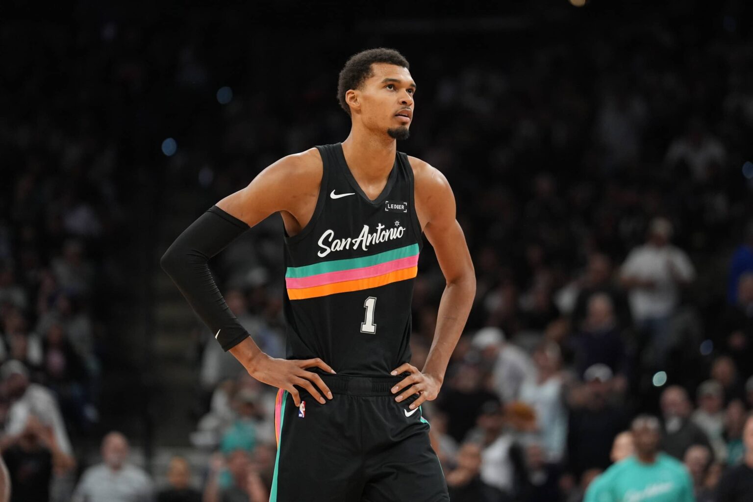 Nov 12, 2025; San Antonio, Texas, USA; San Antonio Spurs forward Victor Wembanyama (1) looks up in the second half against the Golden State Warriors at Frost Bank Center. Mandatory Credit: Daniel Dunn-Imagn Images
