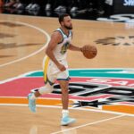 Nov 12, 2025; San Antonio, Texas, USA; Golden State Warriors guard Stephen Curry (30) dribbles up the court in the second half at Frost Bank Center. Mandatory Credit: Daniel Dunn-Imagn Images