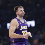Nov 12, 2025; Oklahoma City, Oklahoma, USA; Los Angeles Lakers guard Luka Doncic reacts to a fan during the second quarter of a game against the Oklahoma City Thunder at Paycom Center. Mandatory Credit: Alonzo Adams-Imagn Images