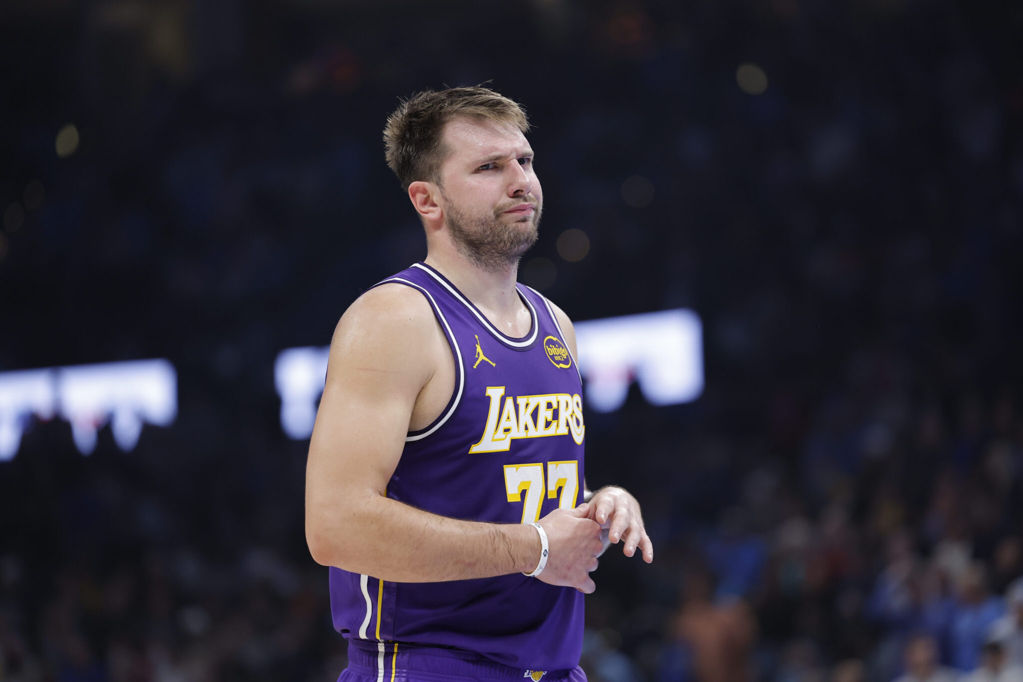 Nov 12, 2025; Oklahoma City, Oklahoma, USA; Los Angeles Lakers guard Luka Doncic reacts to a fan during the second quarter of a game against the Oklahoma City Thunder at Paycom Center. Mandatory Credit: Alonzo Adams-Imagn Images