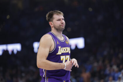Nov 12, 2025; Oklahoma City, Oklahoma, USA; Los Angeles Lakers guard Luka Doncic reacts to a fan during the second quarter of a game against the Oklahoma City Thunder at Paycom Center. Mandatory Credit: Alonzo Adams-Imagn Images