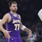 Nov 12, 2025; Oklahoma City, Oklahoma, USA; Los Angeles Lakers guard Luka Doncic reacts to a fan during the second quarter of a game against the Oklahoma City Thunder at Paycom Center. Mandatory Credit: Alonzo Adams-Imagn Images