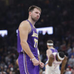 Nov 12, 2025; Oklahoma City, Oklahoma, USA; Los Angeles Lakers guard Luka Doncic reacts to a fan during the second quarter of a game against the Oklahoma City Thunder at Paycom Center. Mandatory Credit: Alonzo Adams-Imagn Images
