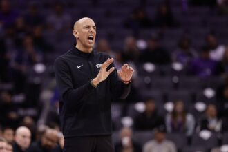 Nov 12, 2025; Sacramento, California, USA; Sacramento Kings head coach Doug Christie on the sideline during the fourth quarter against the Atlanta Hawks at Golden 1 Center. Mandatory Credit: Kelley L Cox-Imagn Images