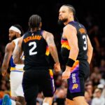 Nov 13, 2025; Phoenix, Arizona, USA; Phoenix Suns forward Dillon Brooks (3) reacts to a score during the second half of the game at Mortgage Matchup Center. Mandatory Credit: Arianna Grainey-Imagn Images