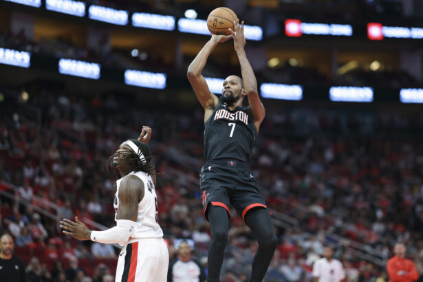 Nov 14, 2025; Houston, Texas, USA; Houston Rockets forward Kevin Durant (7) shoots the ball over Portland Trail Blazers center Robert Williams III (35) during the second quarter at Toyota Center. Mandatory Credit: Troy Taormina-Imagn Images