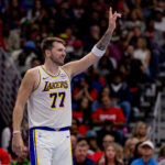 Nov 14, 2025; New Orleans, Louisiana, USA; Los Angeles Lakers forward/guard Luka Dončić (77) reacts to a play against the New Orleans Pelicans during the first half at Smoothie King Center. Mandatory Credit: Stephen Lew-Imagn Images