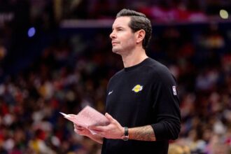 Nov 14, 2025; New Orleans, Louisiana, USA; Los Angeles Lakers Head Coach JJ Redick looks on against the New Orleans Pelicans during the second half at Smoothie King Center. Mandatory Credit: Stephen Lew-Imagn Images