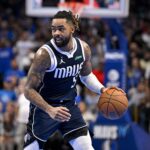 Nov 14, 2025; Dallas, Texas, USA; Dallas Mavericks guard D'Angelo Russell (5) brings the ball up court against the LA Clippers during the second half in an NBA Cup game at the American Airlines Center. Mandatory Credit: Jerome Miron-Imagn Images