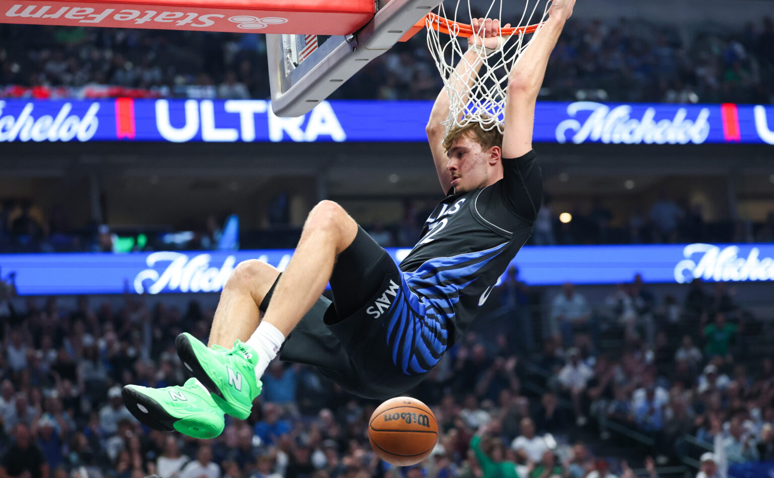 Nov 16, 2025; Dallas, Texas, USA; Dallas Mavericks forward Cooper Flagg (32) dunks during the first quarter against the Portland Trail Blazers at American Airlines Center. Mandatory Credit: Kevin Jairaj-Imagn Images