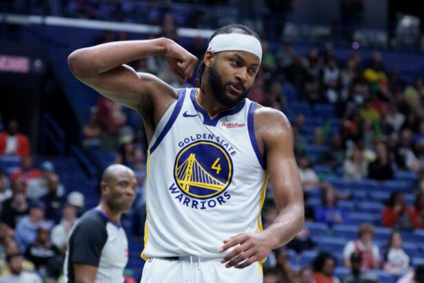 Nov 16, 2025; New Orleans, Louisiana, USA; Golden State Warriors guard Moses Moody (4) reacts after a dunk against the New Orleans Pelicans during the second half at Smoothie King Center. Mandatory Credit: Matthew Hinton-Imagn Images