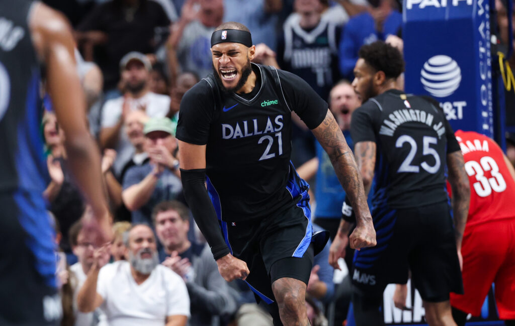 Nov 16, 2025; Dallas, Texas, USA; Dallas Mavericks forward Daniel Gafford (21) reacts against the Portland Trail Blazers in overtime at American Airlines Center. Mandatory Credit: Kevin Jairaj-Imagn Images