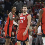 Nov 16, 2025; Houston, Texas, USA; Houston Rockets center Alperen Sengun (28) reacts after making a basket during overtime against the Orlando Magic at Toyota Center. Mandatory Credit: Troy Taormina-Imagn Images