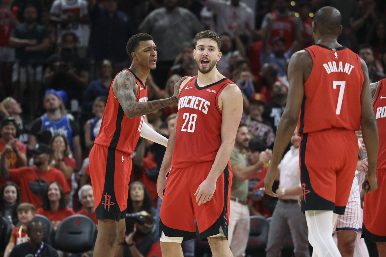 Nov 16, 2025; Houston, Texas, USA; Houston Rockets center Alperen Sengun (28) reacts after making a basket during overtime against the Orlando Magic at Toyota Center. Mandatory Credit: Troy Taormina-Imagn Images