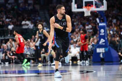 Nov 16, 2025; Dallas, Texas, USA; Dallas Mavericks guard Klay Thompson (31) reacts after scoring during the second half against the Portland Trail Blazers at American Airlines Center. Mandatory Credit: Kevin Jairaj-Imagn Images