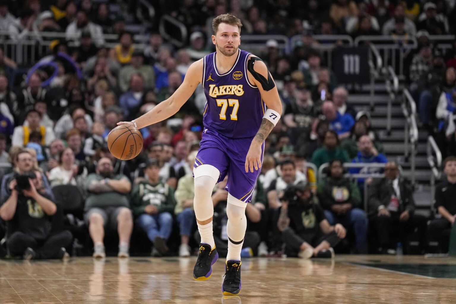 Nov 15, 2025; Milwaukee, Wisconsin, USA; Los Angeles Lakers guard Luka Doncic (77) during the game against the Milwaukee Bucks at Fiserv Forum. Mandatory Credit: Jeff Hanisch-Imagn Images
