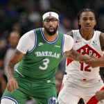 Oct 26, 2025; Dallas, Texas, USA; Dallas Mavericks forward Anthony Davis (3) and Toronto Raptors forward Collin Murray-Boyles (12) look for the ball during the game between the Mavericks and the Raptors at the American Airlines Center. Mandatory Credit: Jerome Miron-Imagn Images
