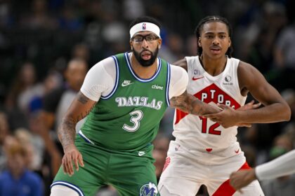 Oct 26, 2025; Dallas, Texas, USA; Dallas Mavericks forward Anthony Davis (3) and Toronto Raptors forward Collin Murray-Boyles (12) look for the ball during the game between the Mavericks and the Raptors at the American Airlines Center. Mandatory Credit: Jerome Miron-Imagn Images