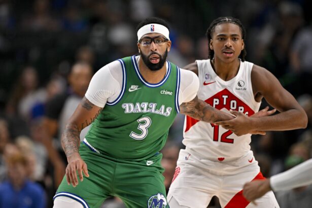 Oct 26, 2025; Dallas, Texas, USA; Dallas Mavericks forward Anthony Davis (3) and Toronto Raptors forward Collin Murray-Boyles (12) look for the ball during the game between the Mavericks and the Raptors at the American Airlines Center. Mandatory Credit: Jerome Miron-Imagn Images