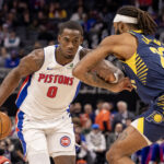 Nov 17, 2025; Detroit, Michigan, USA; Indiana Pacers forward Isaiah Jackson (22) defends against Detroit Pistons center Jalen Duren (0) during the first quarter at Little Caesars Arena. Mandatory Credit: David Reginek-Imagn Images