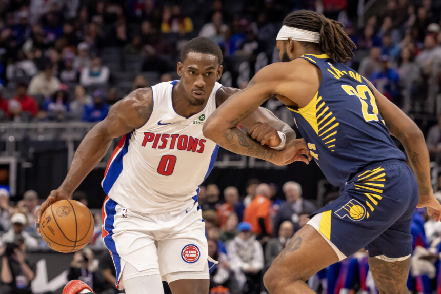 Nov 17, 2025; Detroit, Michigan, USA; Indiana Pacers forward Isaiah Jackson (22) defends against Detroit Pistons center Jalen Duren (0) during the first quarter at Little Caesars Arena. Mandatory Credit: David Reginek-Imagn Images