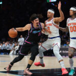 Nov 17, 2025; Miami, Florida, USA; Miami Heat forward Jaime Jaquez Jr. (11) drives to the basket against New York Knicks guard Josh Hart (3) during the second quarter at Kaseya Center. Mandatory Credit: Sam Navarro-Imagn Images