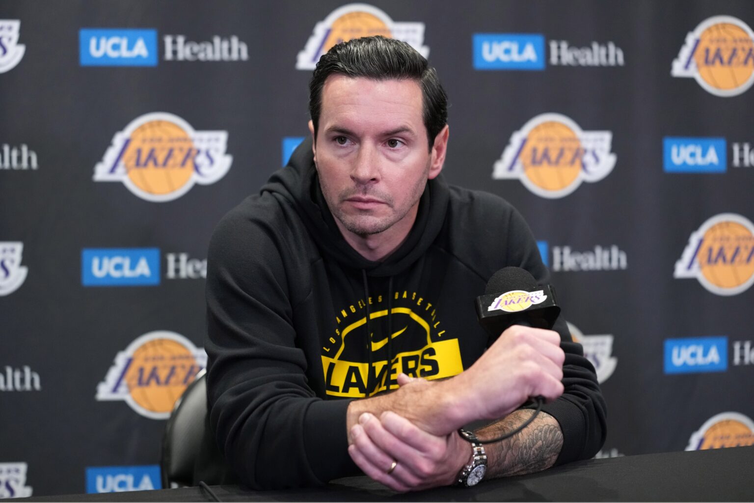 Nov 18, 2025; Los Angeles, California, USA; Los Angeles Lakers head coach JJ Redick at press conference at Crypto.com Arena. Mandatory Credit: Kirby Lee-Imagn Images