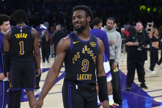 Nov 18, 2025; Los Angeles, California, USA; Los Angeles Lakers guard Bronny James (9) reacts after the game against the Utah Jazz at Crypto.com Arena. Mandatory Credit: Kirby Lee-Imagn Images