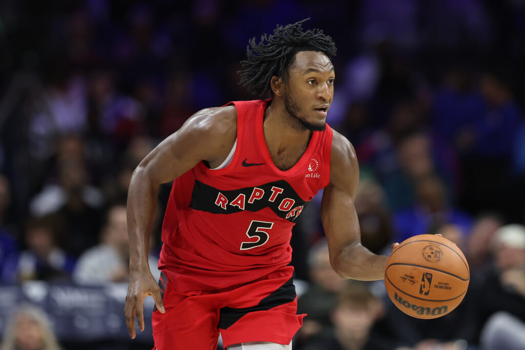Nov 19, 2025; Philadelphia, Pennsylvania, USA; Toronto Raptors guard Immanuel Quickley (5) controls the ball against the Philadelphia 76ers during the third quarter at Xfinity Mobile Arena. Mandatory Credit: Bill Streicher-Imagn Images