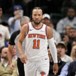 Nov 19, 2025; Dallas, Texas, USA; New York Knicks guard Jalen Brunson (11) looks on during the second quarter against the Dallas Mavericks at the American Airlines Center. Mandatory Credit: Jerome Miron-Imagn Images