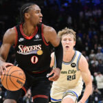 Nov 20, 2025; Milwaukee, Wisconsin, USA; Philadelphia 76ers guard Tyrese Maxey (0) looks for a shot against Milwaukee Bucks guard AJ Green (20) in the first overtime at Fiserv Forum. Mandatory Credit: Benny Sieu-Imagn Images