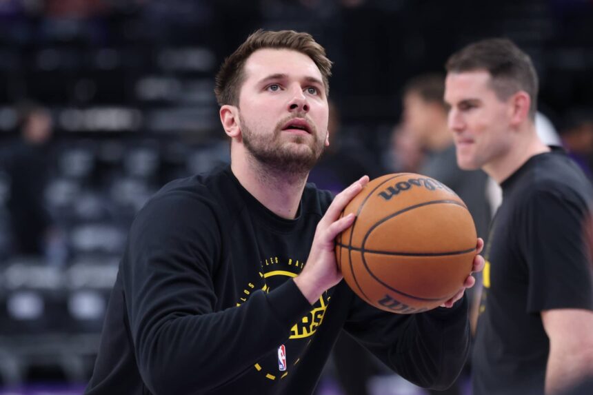 Nov 23, 2025; Salt Lake City, Utah, USA; Los Angeles Lakers guard Luka Doncic (77) warms up before the game against the Utah Jazz at Delta Center. Mandatory Credit: Rob Gray-Imagn Images
