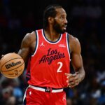 Nov 23, 2025; Cleveland, Ohio, USA; Los Angeles Clippers forward Kawhi Leonard (2) brings the ball up court against the Cleveland Cavaliers during the second half at Rocket Arena. Mandatory Credit: Ken Blaze-Imagn Images