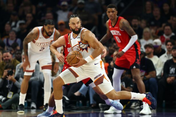 Nov 24, 2025; Phoenix, Arizona, USA; Phoenix Suns forward Dillon Brooks (3) against the Houston Rockets in the first half at Mortgage Matchup Center. Mandatory Credit: Mark J. Rebilas-Imagn Images
