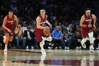 Nov 24, 2025; Miami, Florida, USA; Miami Heat guard Tyler Herro (14) brings the ball up the court against the Dallas Mavericks in the first half at Kaseya Center. Mandatory Credit: Jim Rassol-Imagn Images