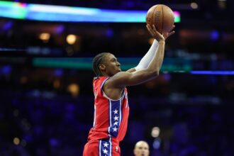 Nov 25, 2025; Philadelphia, Pennsylvania, USA; Philadelphia 76ers guard Tyrese Maxey (0) shoots against the Orlando Magic during the third quarter at Xfinity Mobile Arena. Mandatory Credit: Bill Streicher-Imagn Images