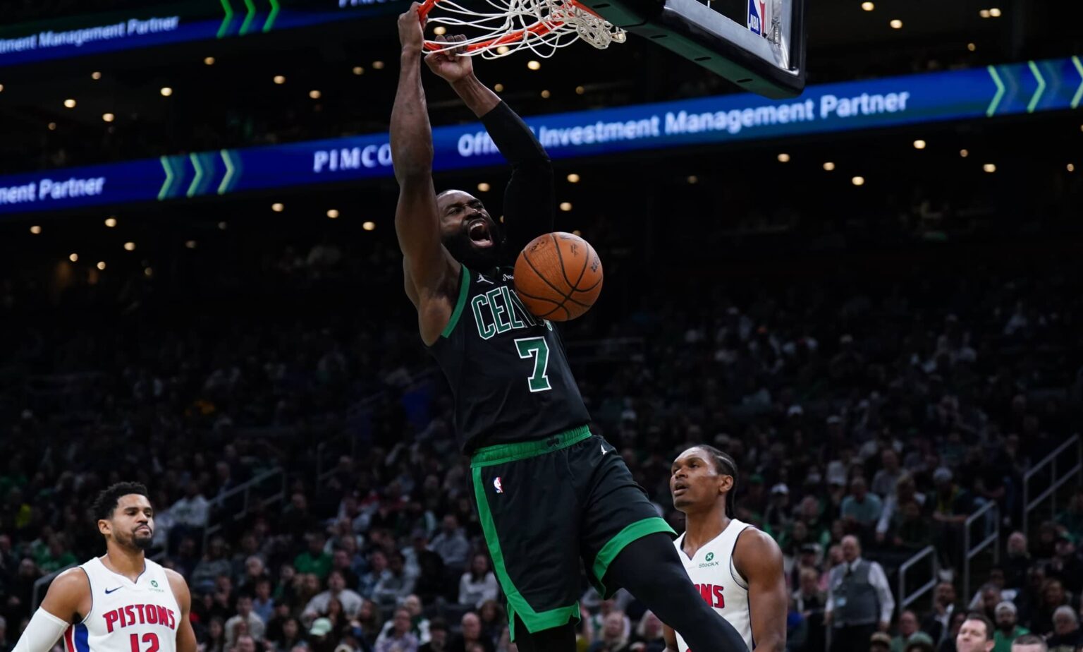 Nov 26, 2025; Boston, Massachusetts, USA; Boston Celtics guard Jaylen Brown (7) makes the basket against the Detroit Pistons in the second half at TD Garden. Mandatory Credit: David Butler II-Imagn Images